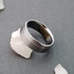 Titanium Wedding Ring with a Solid Off-Center Platinum Inlay in a Flat Profile