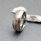 18K solid rose gold & titanium band, with our exclusive "Mosaic" finish. Handcrafted by Classic Titanium.