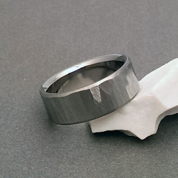 Beautiful hand ground "Wood Grain Sequoia" finished titanium ring in a flat profile with beveled edges.