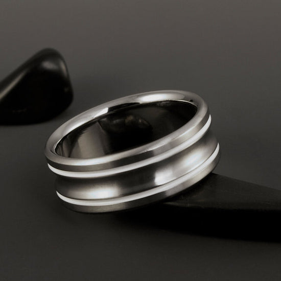 Titanium Ring with two White Pinstripe Inlays and a Concave Center