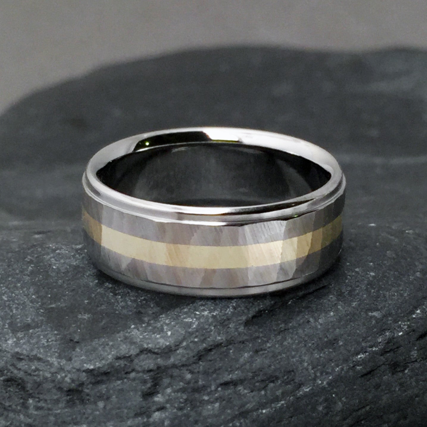 Beautiful hand ground "Wood Grain Sequoia" finished titanium ring in a flat profile, with one wide solid 18k gold centered pinstripe