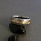 Beautiful hand ground "Mosaic" finished titanium ring in a domed profile, with one wide solid 18k gold centered pinstripe.